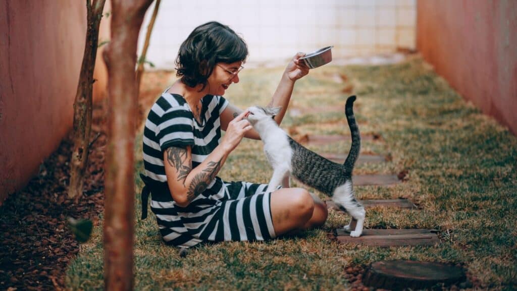A woman with her cat.