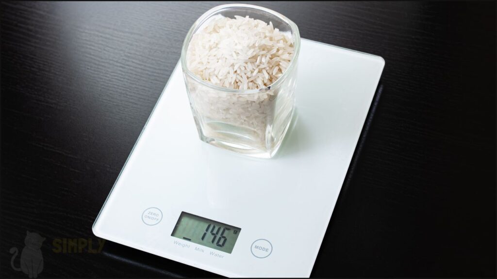 Rice being weighed on a scale
