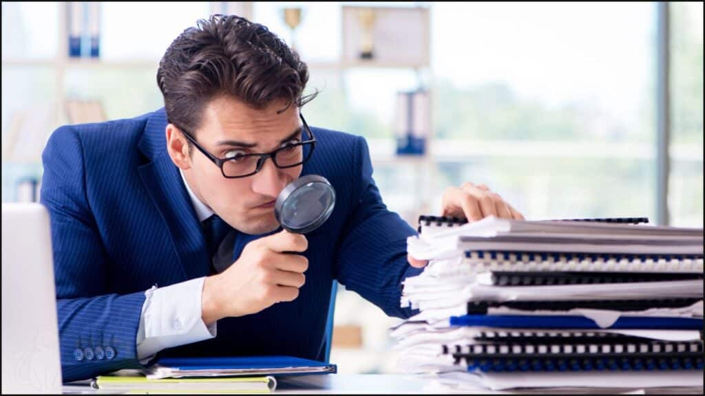 A man looking through papers