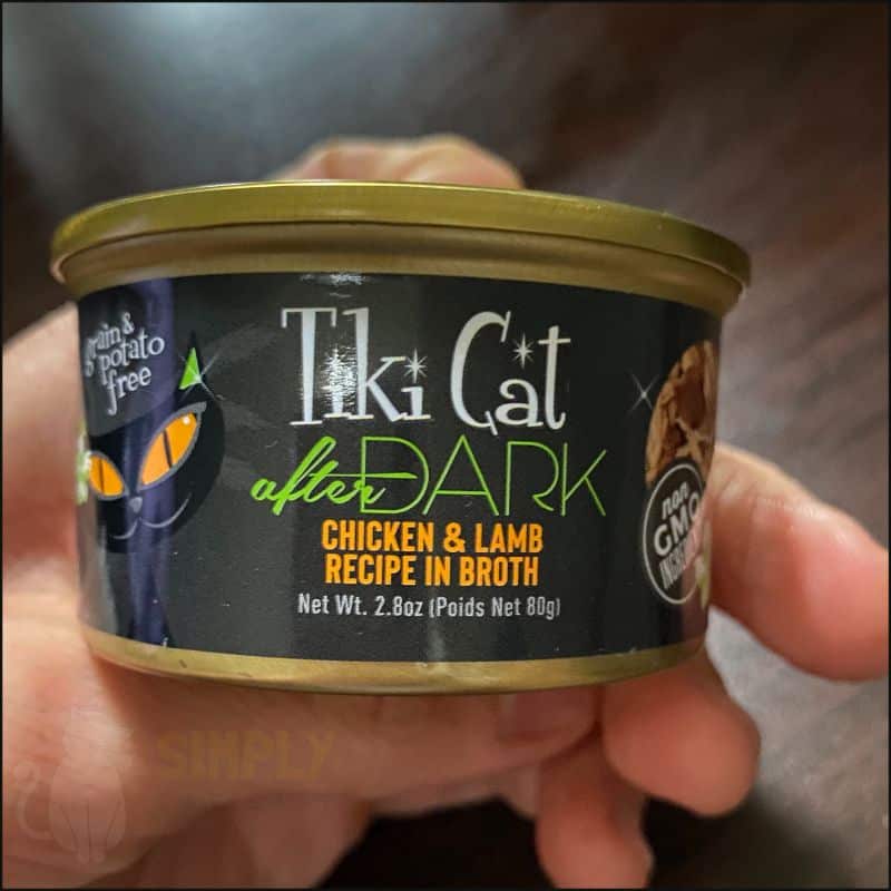 A photo showing a can of Tiki Cat After Dark cat food